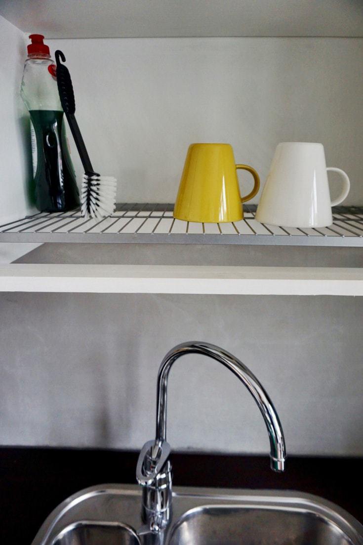 Drying Racks Above Sink Inside Kitchen Cabinet. Hidden Cabinet -   Finland