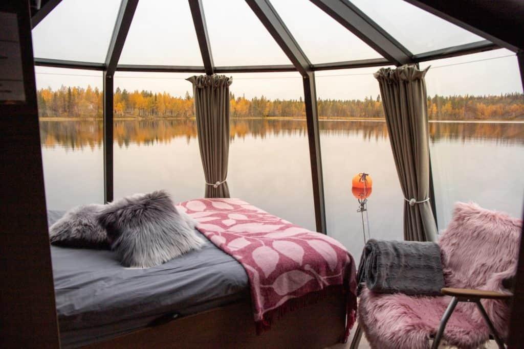 glass igloo cabin on the lake