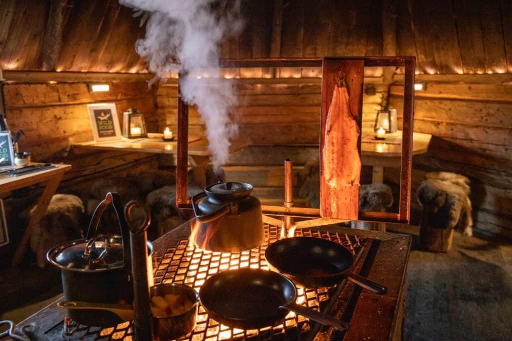 Pots and pans over a fire stove