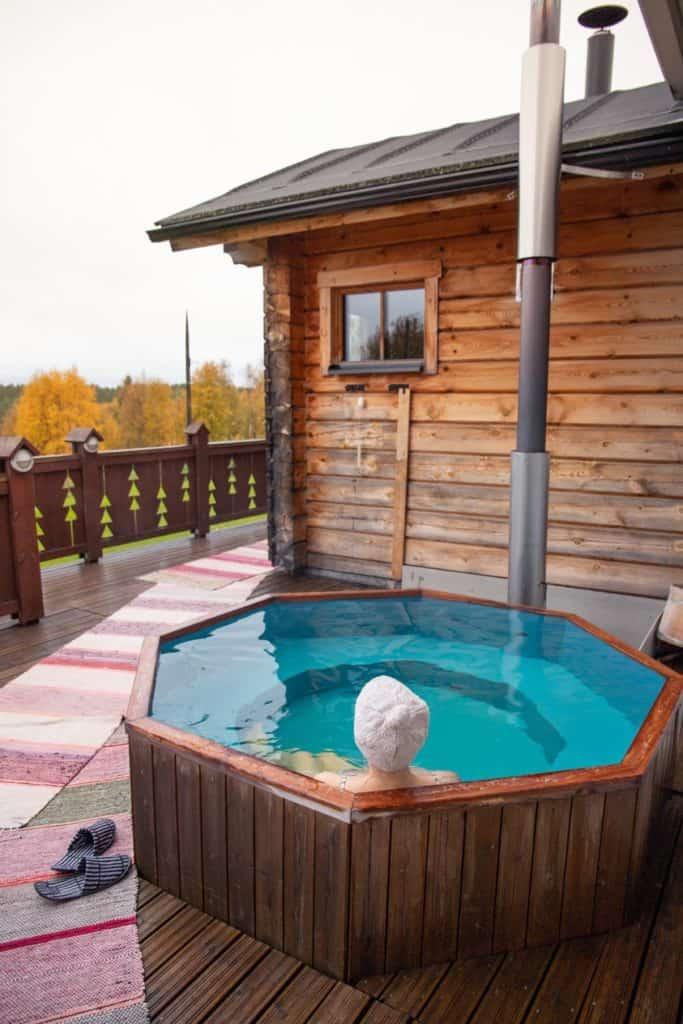 person sitting in a hot tub