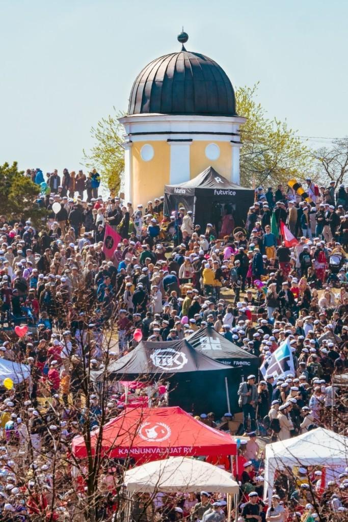 Kaivopuisto park is full of people on May First when Finns celebrate vappu